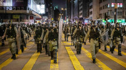 China Threatens Intervention in Hong Kong